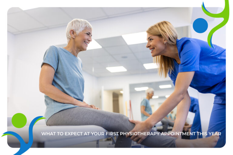 A physiotherapist helps an elderly patient stretch her leg.